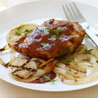 Orange Chipotle BBQ Pork Chops with Grilled Onions